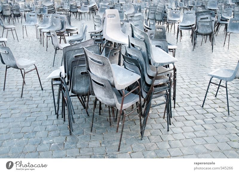 Find the table! Vacation & Travel Tourism Chair Event Culture Places Sit Stand Many Gray Stack pile Paving stone Gloomy mass Seating Empty Chaos Summer seated