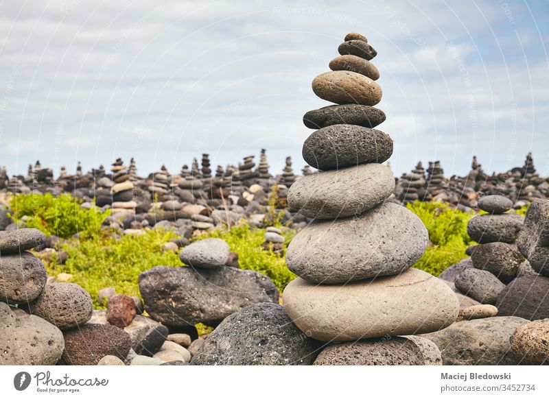 Stone stack on a beach, balance concept. stone pebble nature peaceful harmony meditation lifestyle pyramid equilibrium simplicity nobody calm outdoors symbol