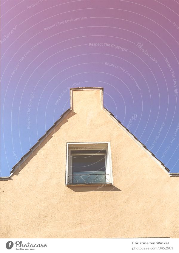 House gables with window in front of blue and pink sky Blue sky Pink Neutral Background House (Residential Structure) Roof house gables Gable gable wall Sky Day
