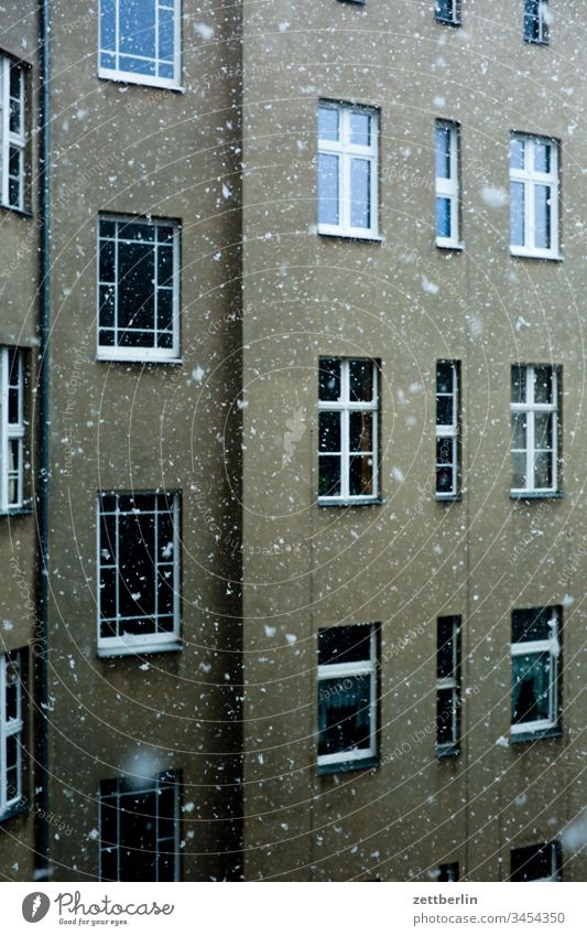 Snowfall before empty windows Old building on the outside Facade Window House (Residential Structure) rear building Backyard Courtyard Interior courtyard