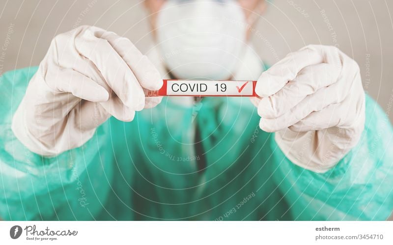 Coronavirus.foreground of Medical worker doctor holding test tube with blood for 2019-nCoV coronavirus epidemic pandemic quarantine symptom medicine specimen
