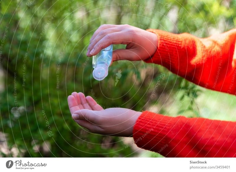Close up woman hands using sanitizer gel dispenser, bacteria coronavirus influenza covid19 covid-19 avoid alcohol care liquid hygienic cleanser medicine wash