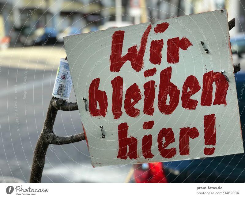 Fight against gentrification: Sign saying "We stay here!" Gentrification Berlin exorbitant rents Rent madness real estate real estate shark Flat (apartment)