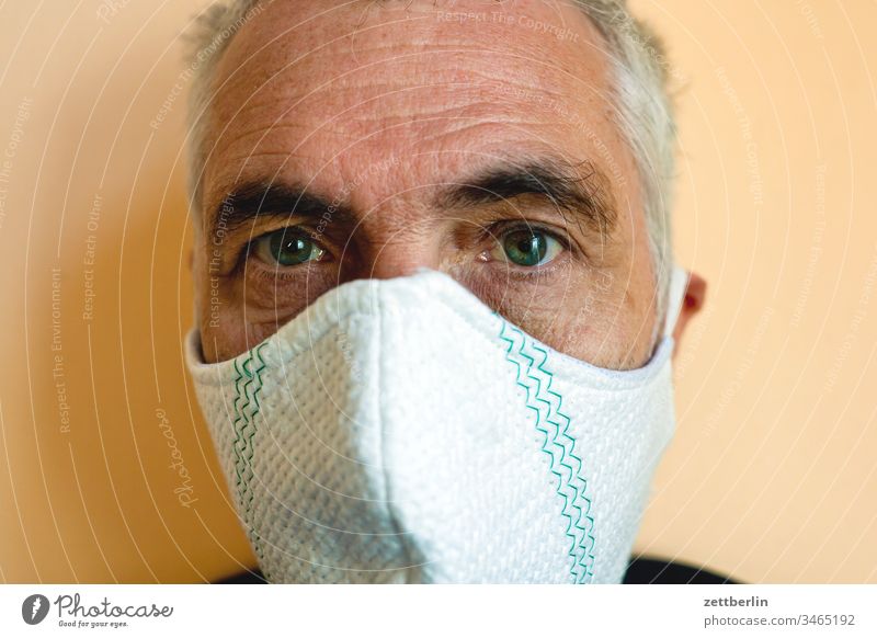 Man with mouth-nose-mask Mask Respiratory protection Face mask Infection Protection against infection Fear corona COVID peril insulation Human being Copy Space