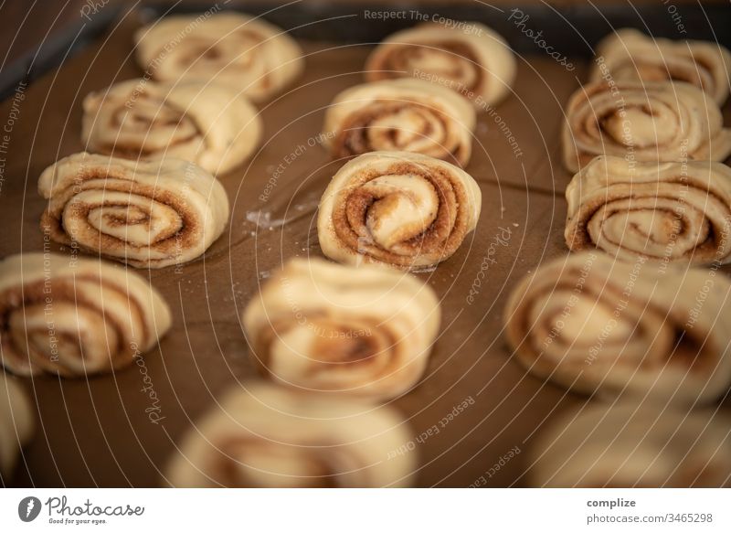 Korvapuusti - Finnish cinnamon buns biscuits Baking tray Delicious back open Tin Sugar Baker at home baking paper Tradition Cinnamon Cardamom