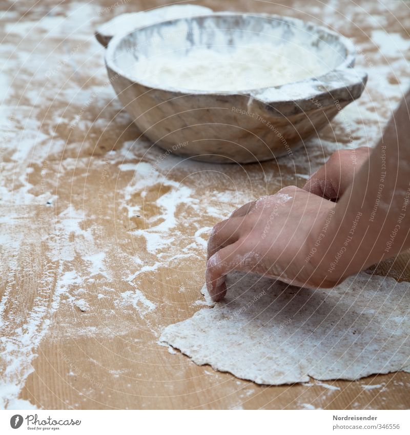 pita bread Food Dough Baked goods Bread Nutrition Bowl Leisure and hobbies Work and employment Arm Hand Fingers Study Old Natural Joy Appetite Poverty Life