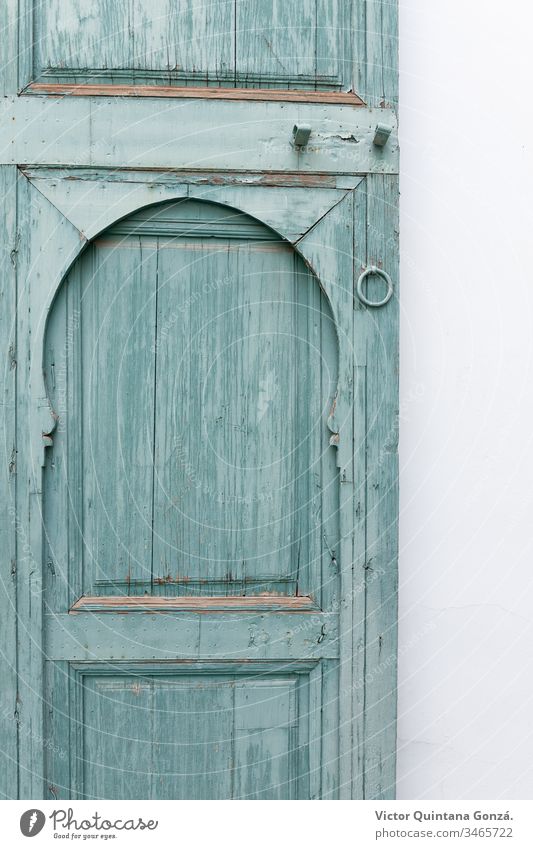 old door painted green Marrakech Morocco africa aquamarine architecture blue dirty doorway entrance exit family gate house interior design lock lumber no person