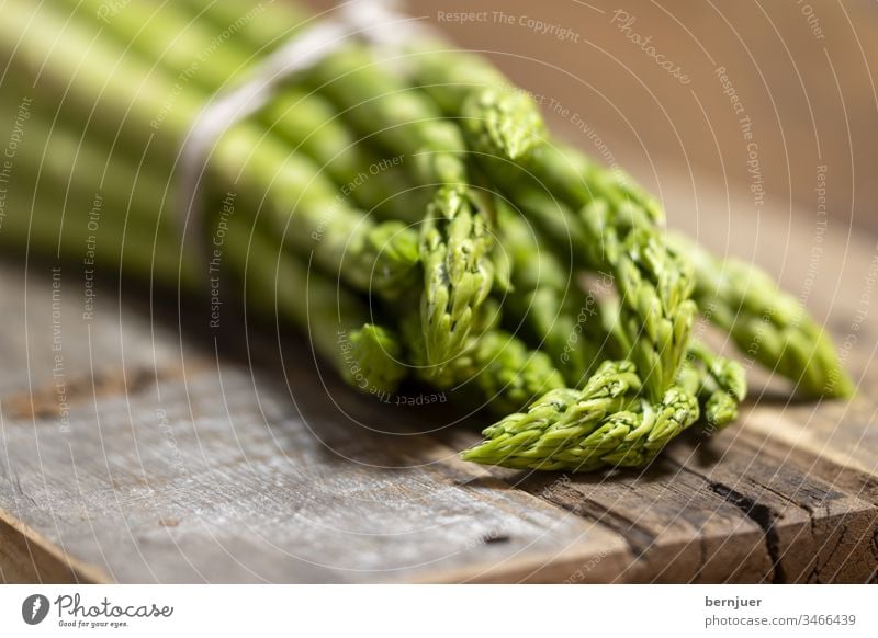 Close up of raw green asparagus Asparagus Green Heap salubriously Nutrition Food Raw ingredient organic Diet Wood vegetarian Vegetable background Fresh Vitamin