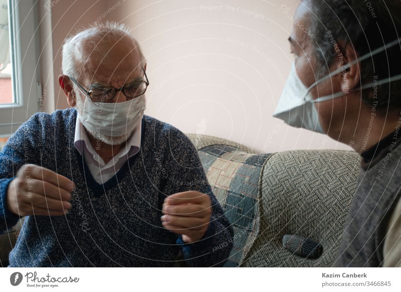 Elderly wearing mask telling his problems about coronavirus turkey turkish corona virus quarantine curfew infection europe street home indoor stayhome