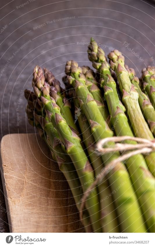 bunch of green asparagus Asparagus Green federation Vegetable Food Nutrition Vegetarian diet Organic produce Healthy Eating Close-up Fresh Bunch of asparagus