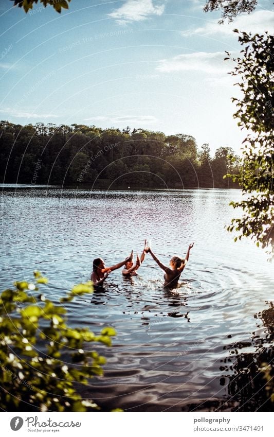 Three friends in the lake enjoy the summertime memory Light Serene Summer feeling Swimming & Bathing Lake Pond Nature Beautiful weather Contentment Friendship