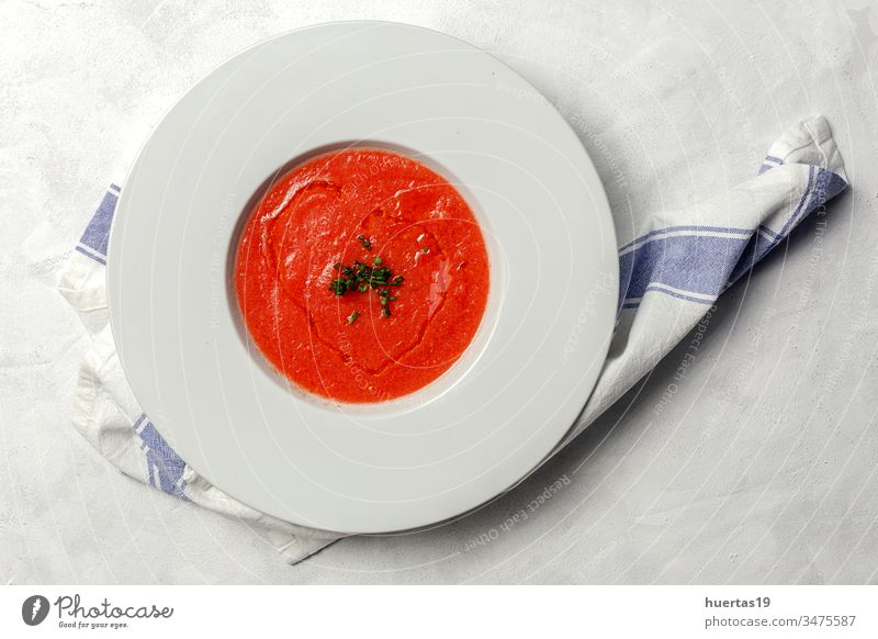Homemade Tomato Soup on white Background soup tomato food bowl healthy lunch dinner meal vegetarian vegetables fresh cream gourmet green dish diet tasty
