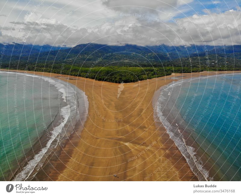 Uvita beach from the sky, Aerial, in Costa Rica costa rica uvita aerial tropics drone uvita beach landscape travel fin road sea mountain nature coast highway