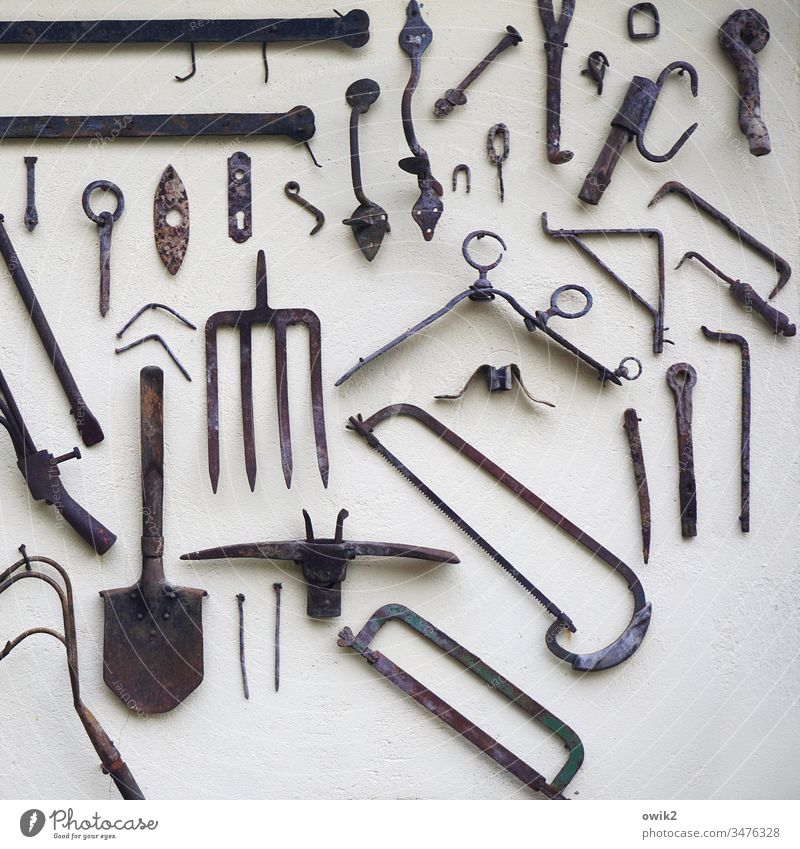 tool kit Wall (building) Tool Saw Spade Fork prongs utensils Metal Things Hang hotchpotch Collection Historic Metal fitting Detail Work and employment