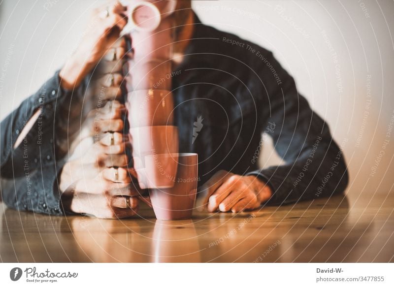 Man drinks coffee from a cup - coffee junkie Mug Drinking swift Movement Addiction Addictive behavior Caffeine Cup Beverage Photomontage Table Thirst Thirsty