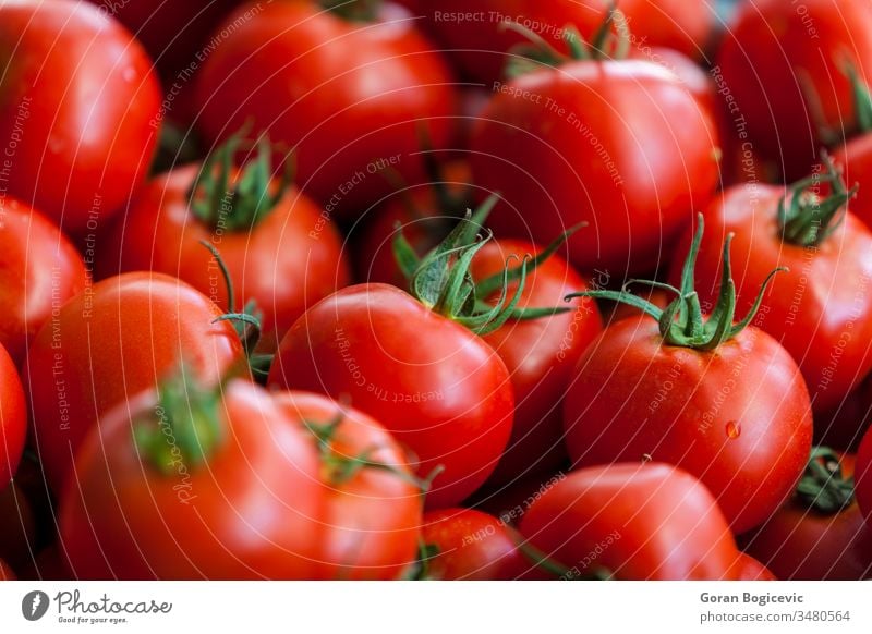 Tomatoes closeup whole white nature natural agriculture fresh food raw nobody healthy ingredient nutrition pile organic tomato vegetable vegetarian group heap