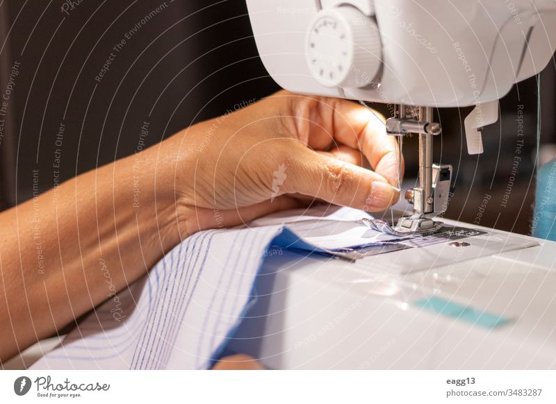 Sewing machine worked by a seamstress Work Working arms artistic buttons clipping concentration create creativity designer designing details efficiency females