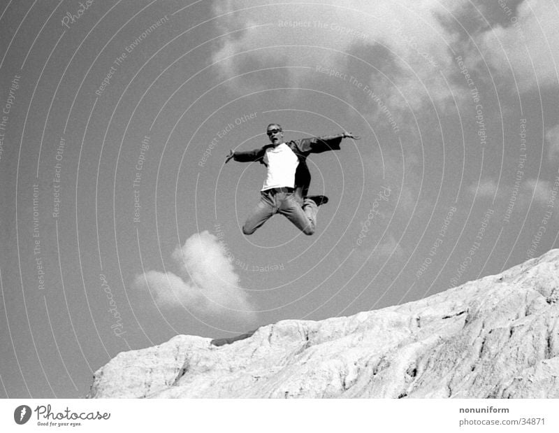 Me, Myself & Eye Jump Clouds Aloof Man Tall Sand Free Joy Black & white photo Freedom Lust Flying Thrill Air Trick jump