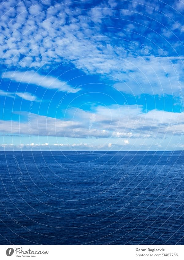 Sea surface above abstract background blue calm clean color liquid nature nobody pattern ripple rippled sea sky view water wave clouds