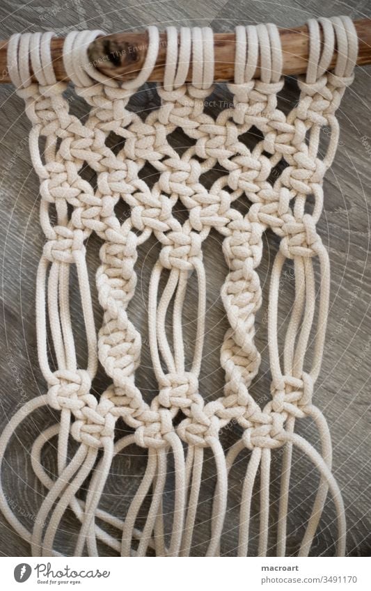 Macramé with driftwood - a Royalty Free Stock Photo from Photocase