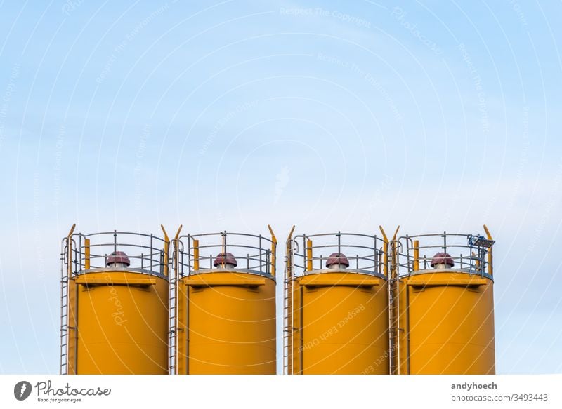 Four silos in front of blue sky abstract any Background building industry Business clear sky concept construction construction site copy space day design