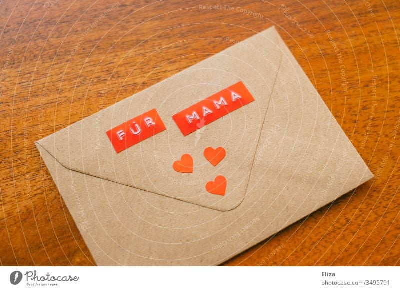 An envelope on the "For Mama" is decorated with red hearts For mom Mother's Day Letter (Mail) Envelope (Mail) Gift Love Affection communication Transmit message