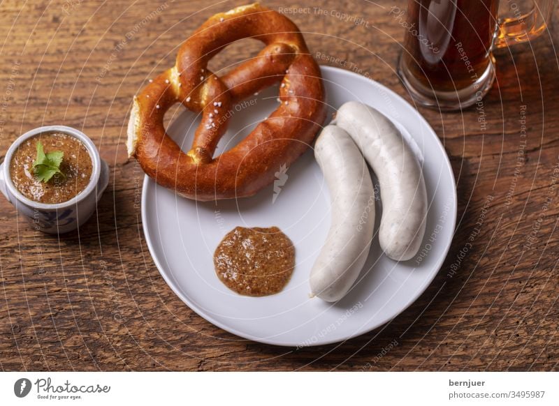 Bavarian white sausages with pretzel Veal sausage Mustard Pretzel Plate Beer bright Beer mug Glass Pot two Couple Oktoberfest Eating White Munich Breakfast