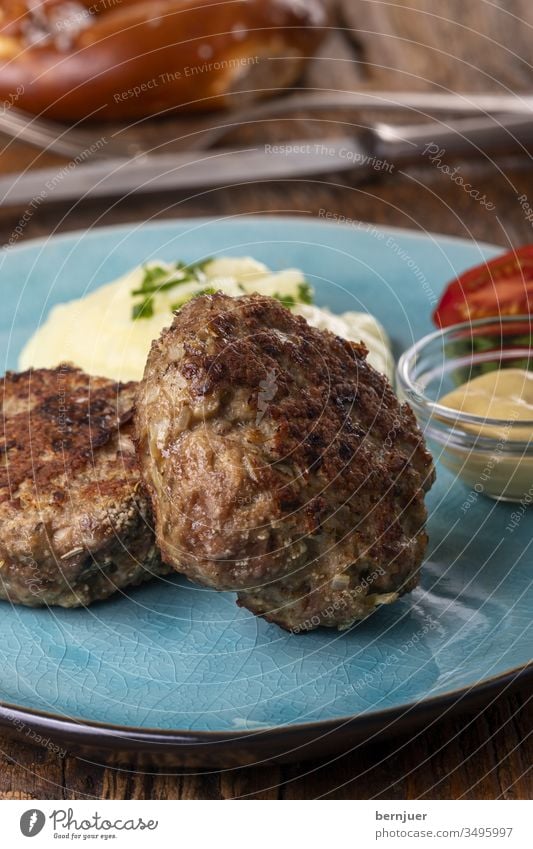 two Bavarian meatballs on one plate herbal Meat Minced meat loaf loaf of meat herbaceous mashed warm nobody Eating Gastronomy ingredient Wood Delicious Milled