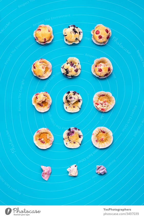 Eating muffins in steps. Fruit muffins top view above view ate bite blueberry muffin breakfast cakes calories collage comfort food composition convenience food
