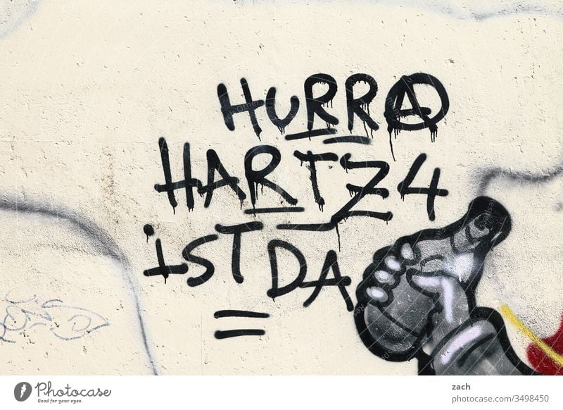 Facade with a Grafitti Hurra Hartz 4 is there Letters (alphabet) Wall (building) Sign Wall (barrier) Copy Space bottom lettering Graffiti Characters