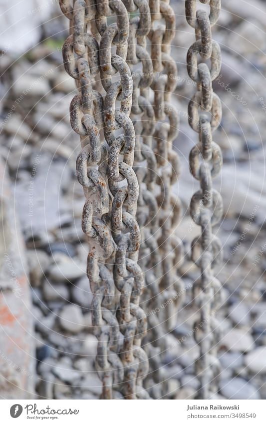 Rusty chains on a construction site Chain link Metal Colour photo Exterior shot Deserted Old Steel Safety Shallow depth of field Strong Attachment Detail