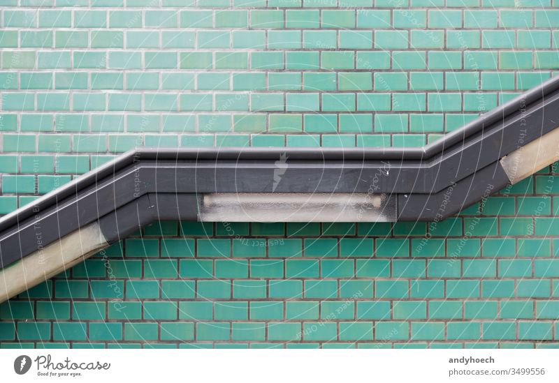 The handrail up the stairs and the turquoise wall abstract access aging architecture ascend Background backgrounds building built structure city classic climb