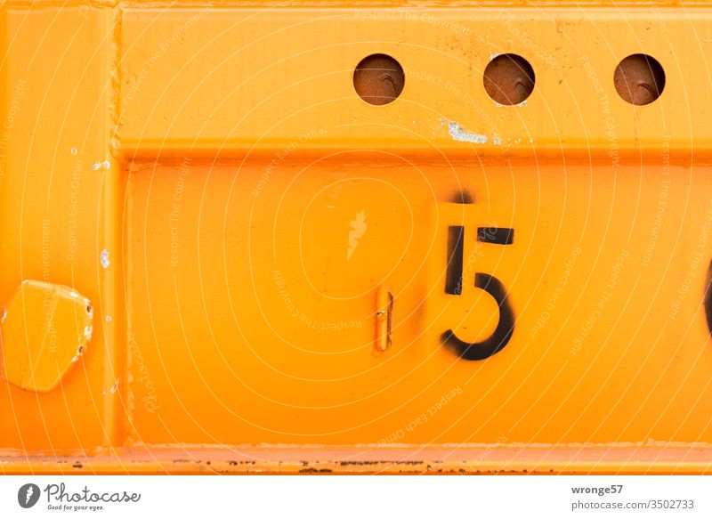 Number 5 - Digit on the wall of an orange container number Digits and numbers Colour photo Deserted Exterior shot Signs and labeling Detail Container