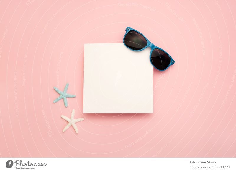 Summer composition with sunglasses and starfish summer tropical beach blank background sea vacation mockup travel empty paper frame message decoration concept