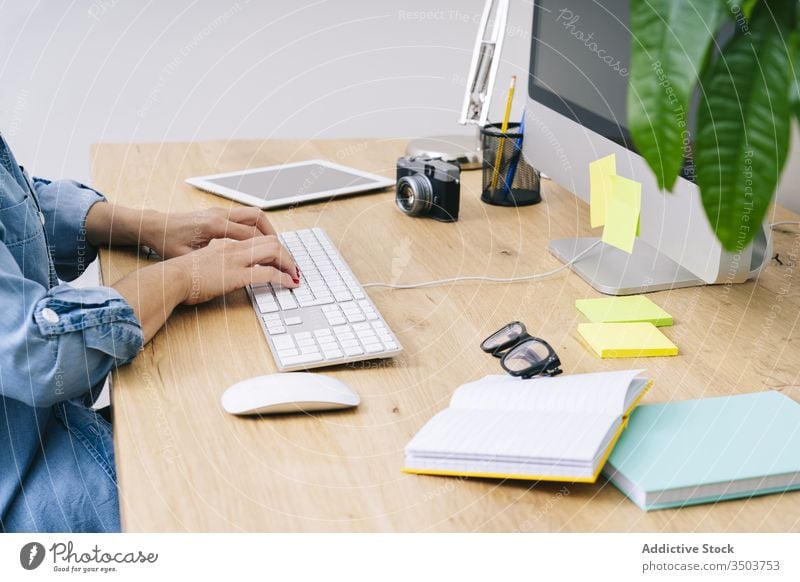 Anonymous woman working at home desk young computer communication businesswoman indoor smart table female laptop desktop design lifestyle office freelance