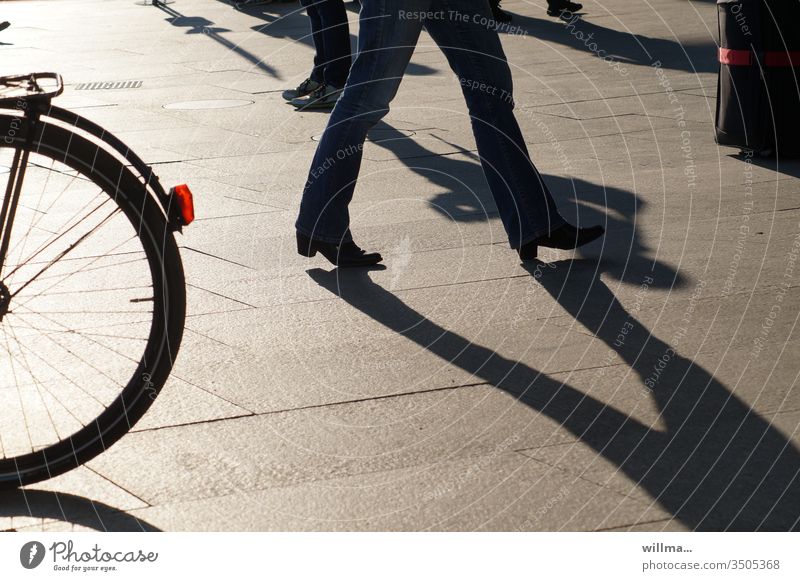 city life shadow legs bicycle suitcase Legs Human being Shadow Going City life Bicycle urban public square Walking Suitcase busyness persons
