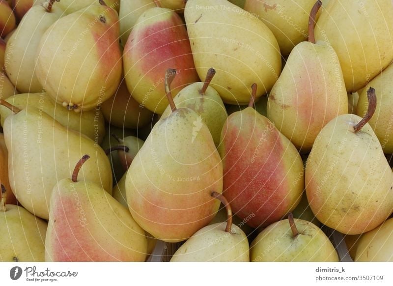 yellow pears fresh fruit background ripe red produce food edible pile many healthy snack agricultural closeup natural raw agriculture antioxidant fruits