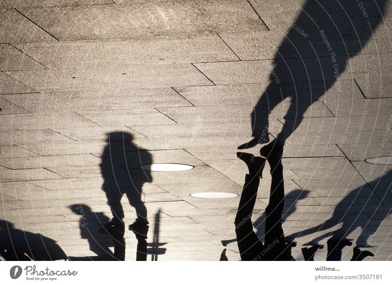 When shadows meet with friends Shadow people pedestrian Group Wait Places public squares urban City life Human being meetings Meet friends Legs