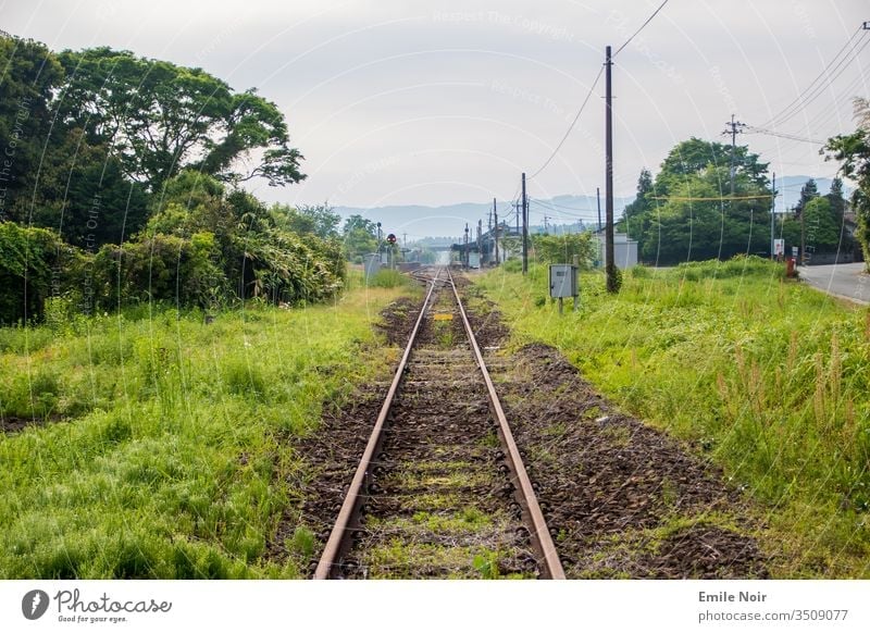 Lonely track in the mountains Track bed rails Nature Old overgrown jungles Volcano Aso Japan