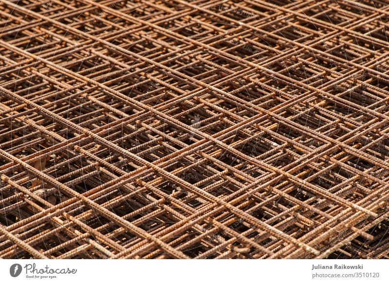 Grid on a construction site Grating Architecture built Manmade structures Construction site Exterior shot Wall (barrier) Town Change Build Work and employment