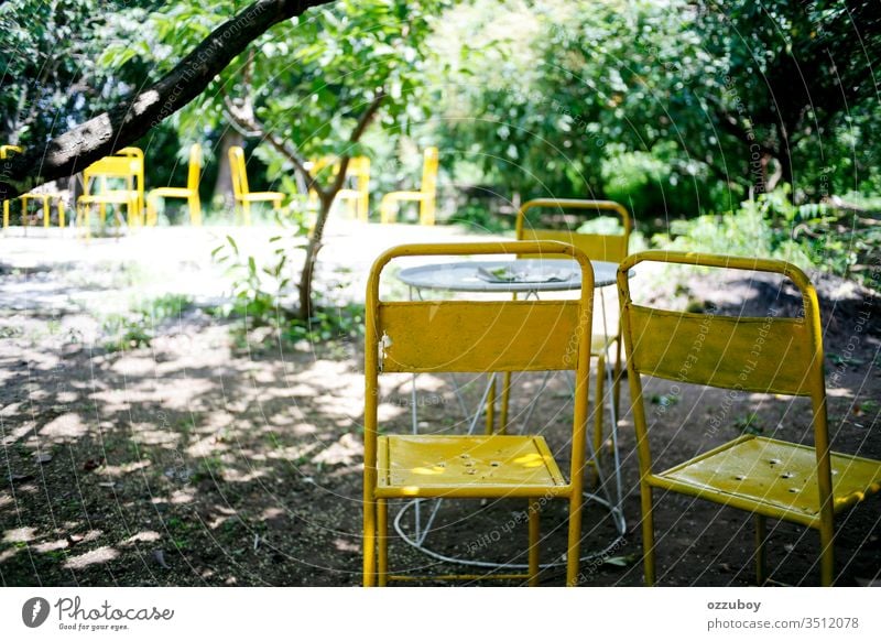 old metal chair in the park Chair yellow Park Copy Space Seat selective focus outdoor desk Minimalistic