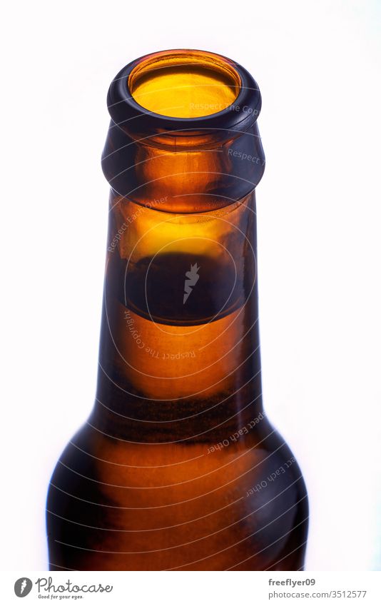 Detail of the bottleneck on a brown bottle beer beverage isolated on white liquid cold mockup mock up reflection glass background filled bubble object drink