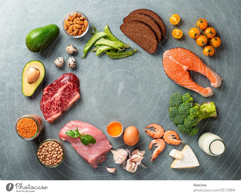 Balanced diet concept, copy space center, top view balanced food assortment balanced diet ingredient healthy broccoli nutrition tomato egg fish meat salmon