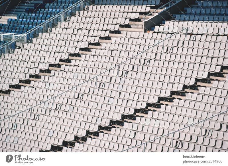 Empty chairs on the tribune of the Olympic Stadium in Barcelona, Spain stadium empty sport seat no people arena nobody white event row plastic game football