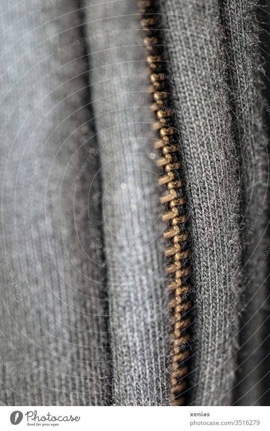 convex or bulged zipper on grey jacket Zipper Gray Cloth Teeth Macro (Extreme close-up) Clothing Fashion Track-suit top sports jacket Closure garment knitwear