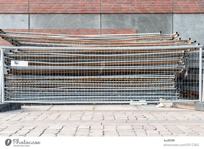 Stacked crush barriers behind crush barriers lattice fence Construction site Grating Barrier Metal Fences Metalware Safety Protection cordon