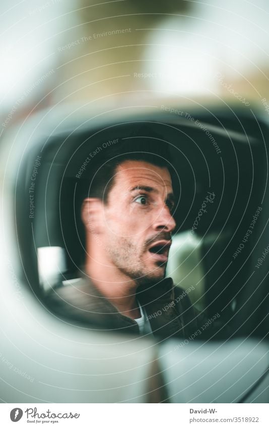 car - car play gel man face startled shortly before the accident Motoring car mirrors Accident Car accident Fear Inattentive Road traffic esteem Face