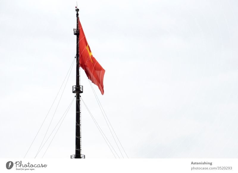 Flagpole with Vietnamese flag, Hue, Vietnam flagpole Sky Red Yellow Textiles ropes Rope Tall great Pole Black Patriotism Day Exterior shot Pride Ensign