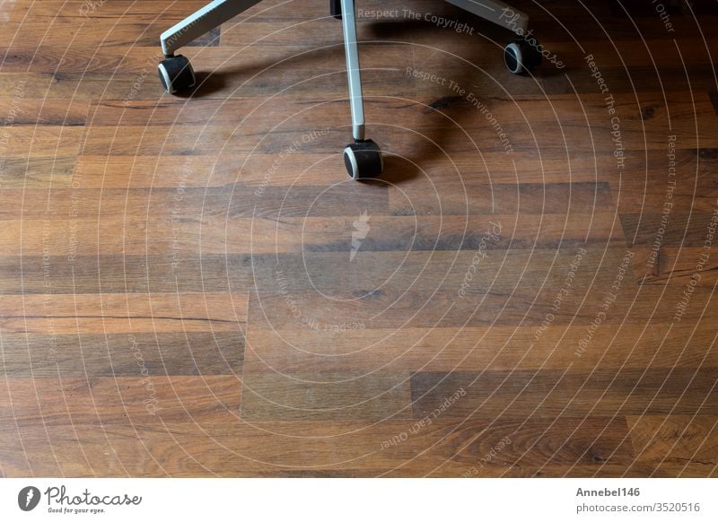 Damaged Laminate Floor from office chair wheels in a home, needs protection aging damage flooring laminate wood grungy hardwood house humidity indoor interior