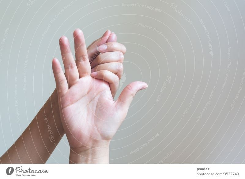 Woman massaging her painful hand. Healthcare and medical concept. ache adult arm arthritis background body carpal caucasian closeup cold cramp disease exercise